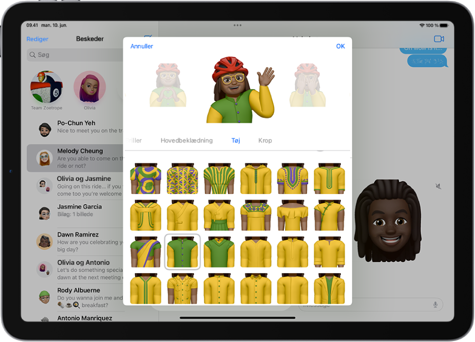 Memoji-skærmen viser i midten den karakter, der oprettes, funktioner, der kan tilpasses, under karakteren, og derunder muligheder for den valgte funktion. Knappen OK findes øverst til højre, og knappen Annuller findes øverst til venstre.