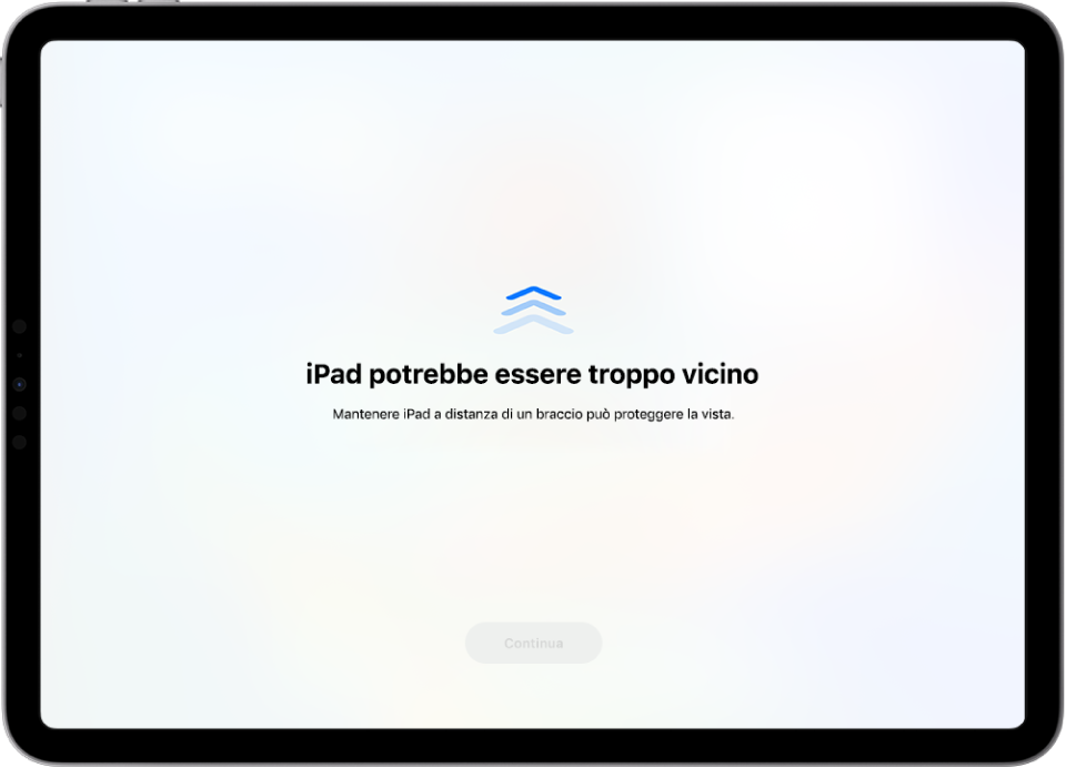 Un avviso sullo schermo che informa che stai tenendo iPad troppo vicino e che dovresti allontanarlo per proteggere la tua salute visiva. L’avviso copre la schermata, impedendoti di continuare. È presente un pulsante Continua che diventa attivo quando sposti iPad a una distanza sicura.