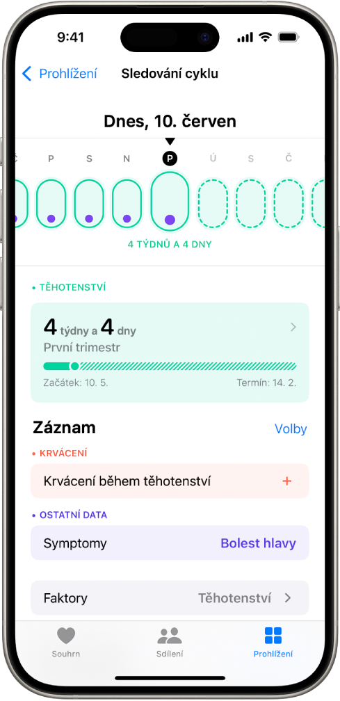 Obrazovka sledování cyklu s týdenní časovou osou těhotenství u horního okraje. Prvních 5 dní je na časové ose označeno světle zelenými ovály a fialovými tečkami. Zbývající dny jsou na časové ose vyznačeny čárkovanými světle zelenými ovály. Pod časovou osou se zobrazují souhrnné informace o těhotenství s uvedením gestačního věku, data začátku a předpokládaného data porodu. Pod souhrnem jsou k dispozici volby pro přidání informací o krvácení během těhotenství a příznacích.