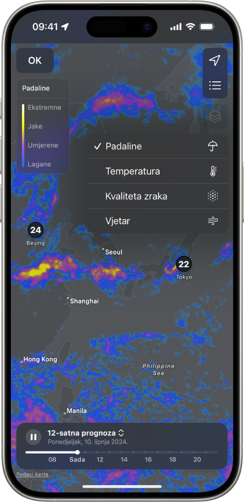Temperaturna karta okolnog područja ispunjava zaslon iPhonea. U gornjem desnom kutu, odozgo prema dolje, nalaze se tipke Trenutačna lokacija, Omiljene lokacije i Izbornik nadsloja. Odabrana je tipka Izbornik nadsloja i prikazuje tipke Padaline, Temperatura, Kvaliteta zraka i Vjetar. Odabrana je tipka Padaline. U gornjem lijevom kutu nalazi se tipka OK i Mjerilo padalina nadsloja karte.