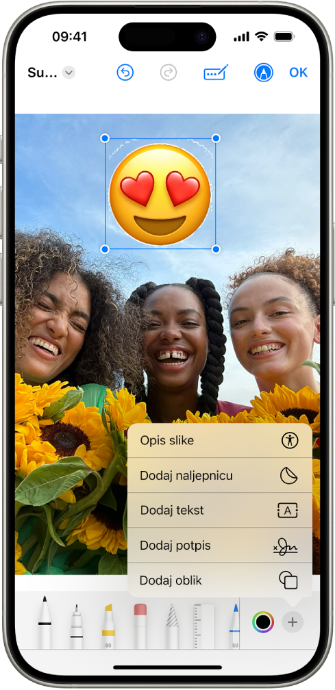 U aplikaciji Mail, PDF privitka ima naljepnicu emojija. Ispod web stranice nalaze se alati za označavanje.