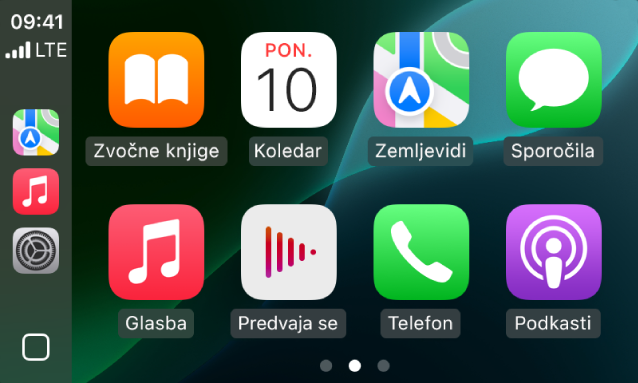 CarPlay Home, ki prikazuje Zemljevidi, Glasba in Sporočila v stranski vrstici. Na desni strani so Zvočne knjige, Koledar, Zemljevidi, Sporočila, Glasba, Predvaja se, Telefon in Podkasti.