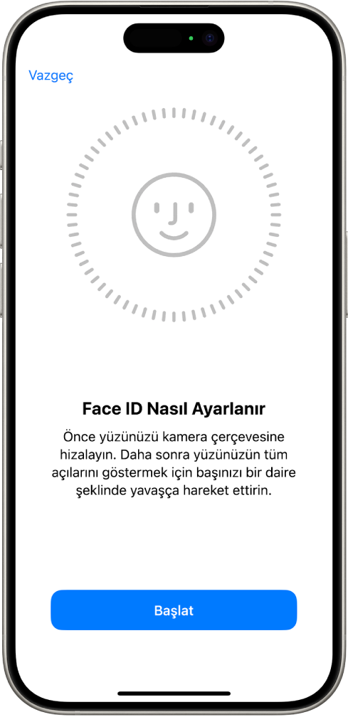 Face ID tanıma ayarlama ekranı. Ekranda, daire içine alınmış bir gülen yüz gösteriliyor. Altındaki metin, kullanıcıya daireyi tamamlamak için kafasını yavaşça hareket ettirmesini söylüyor. Ekranın alt tarafında Başla düğmesi görünüyor.
