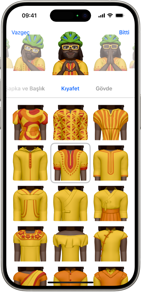 Ortada yaratılan karakteri, karakterin altında özelleştirilecek yanlarını, onun altında da seçilen özelliğe ait seçenekleri gösteren Memoji ekranı. Bitti düğmesi sağ üstte ve Vazgeç düğmesi sol üsttedir.