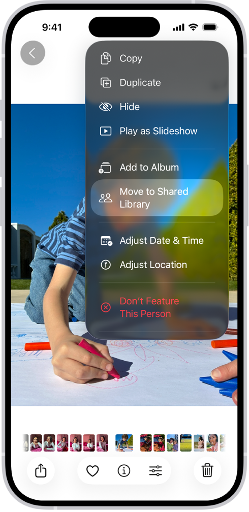 A photo is open in the Photos app. At the top of the screen is the option Move to Shared Library.
