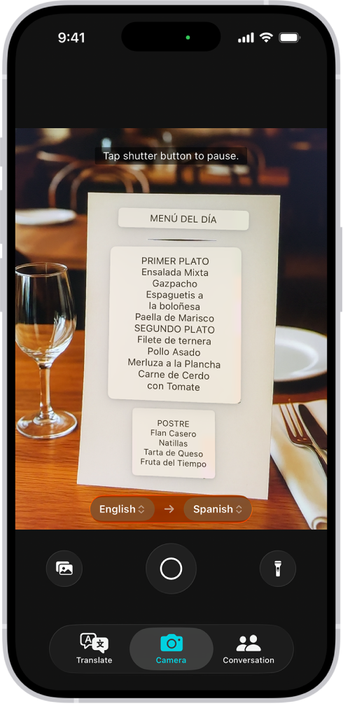 The Camera tab, showing a restaurant menu translated from English to Spanish.
