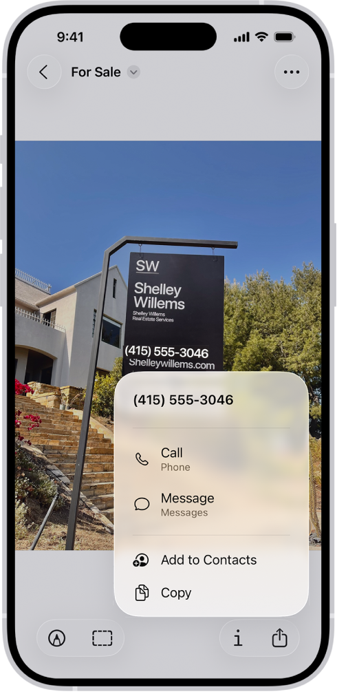 A photo of a real estate sign, with the phone number highlighted. The phone number appears in the menu above the Call, Message, Add to Contacts, and Copy options.