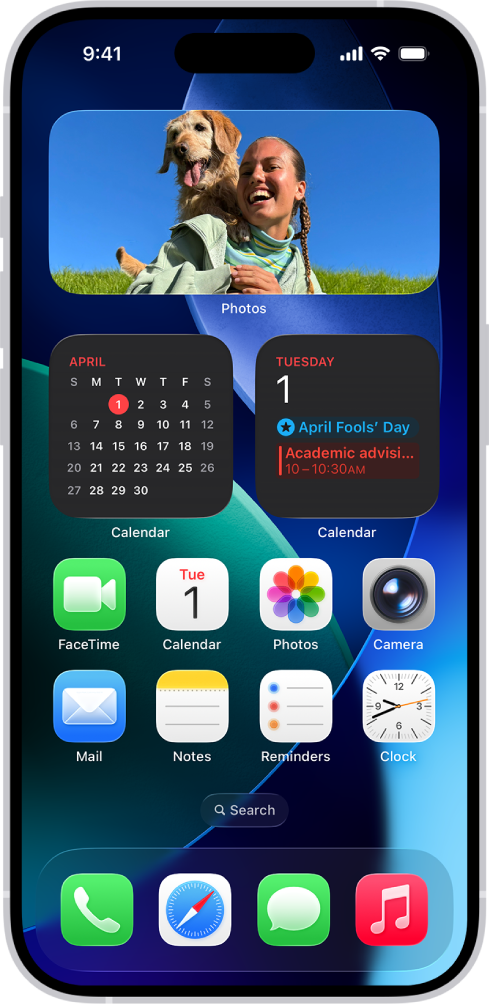 The iPhone Home Screen with Dark Mode on.