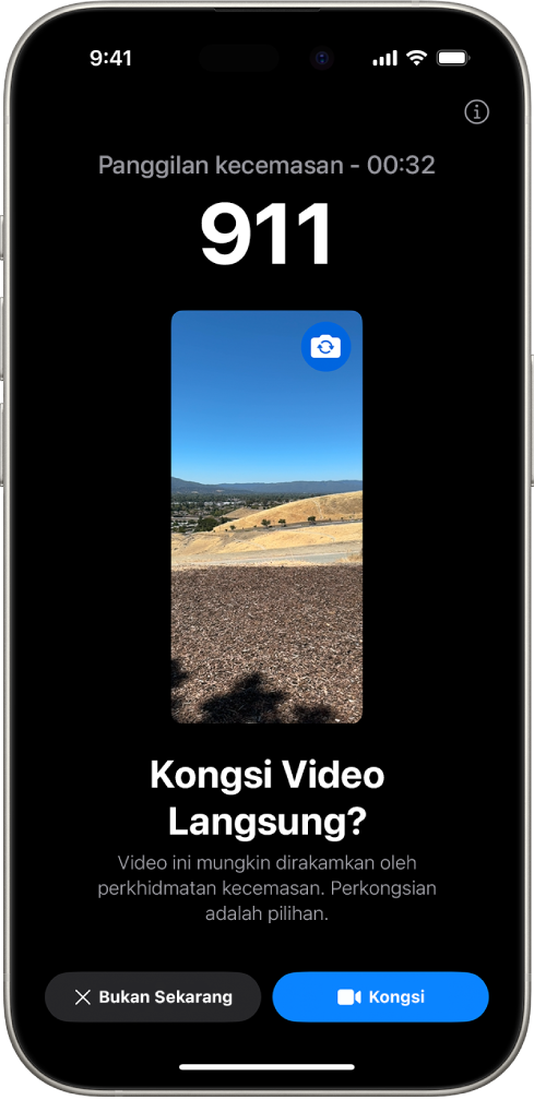 Skrin Video Langsung SOS Kecemasan menunjukkan panggilan kecemasan telefon 911 dengan pratonton video di bahagian tengah. Di bahagian bawah ialah butang untuk Bukan Sekarang dan Kongsi Video.