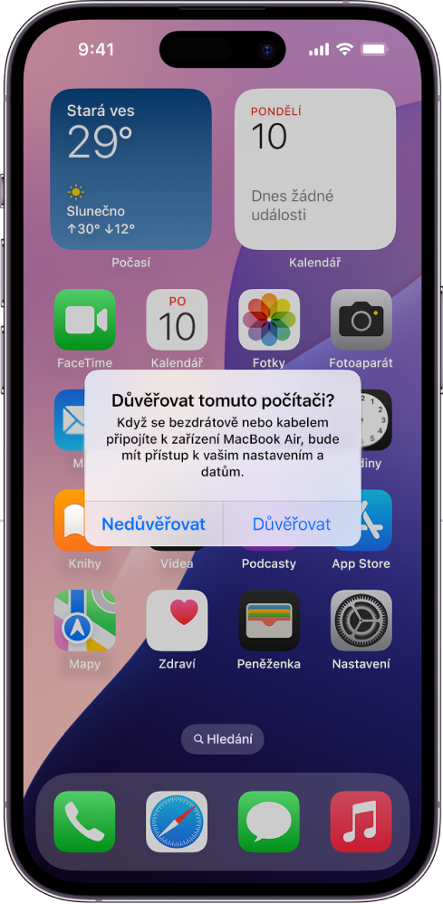 iPad s dialogovým oknem „Důvěřovat tomuto počítači?“, které se zobrazí při prvním připojení k MacBooku Air.