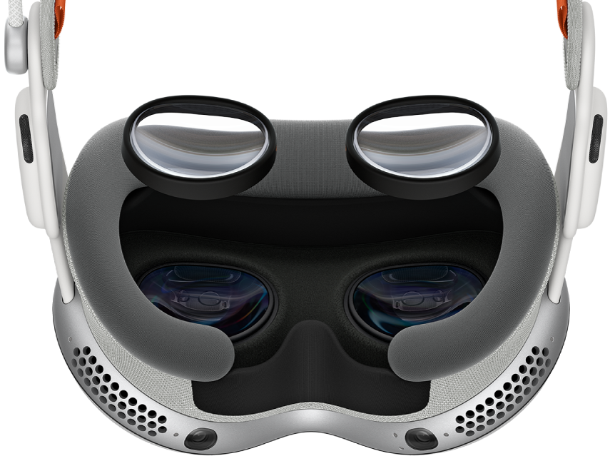 Apple Vision Pro with ZEISS Optical Inserts over the device, to show where they should be attached.