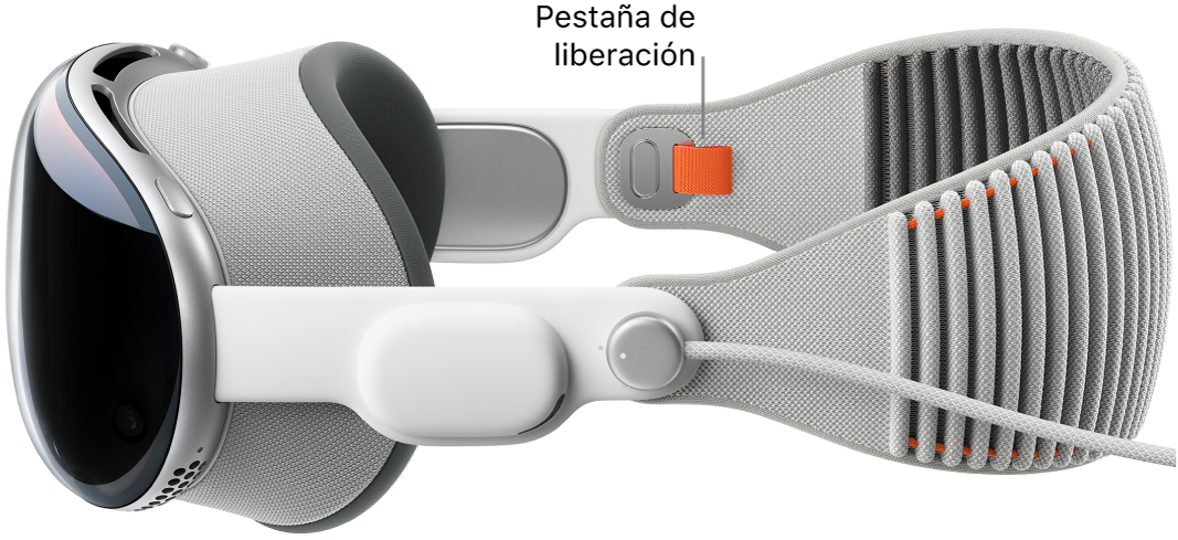 Un Apple Vision Pro con la banda sencilla tejida acoplada. Se muestra la lengüeta sujetadora de color naranja en la parte interior de la banda sencilla tejida.