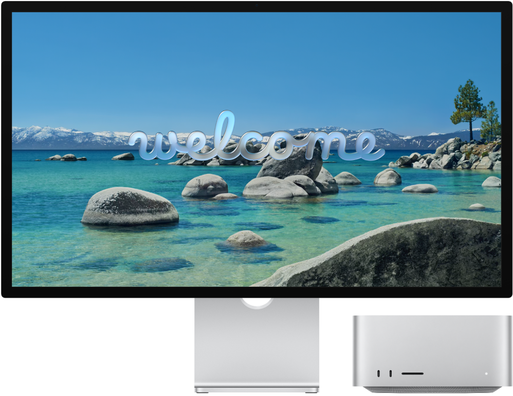 A Studio Display and a Mac Studio side by side with “Welcome” on the screen.