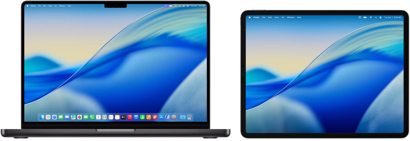 A MacBook Pro and an iPad sit side by side.