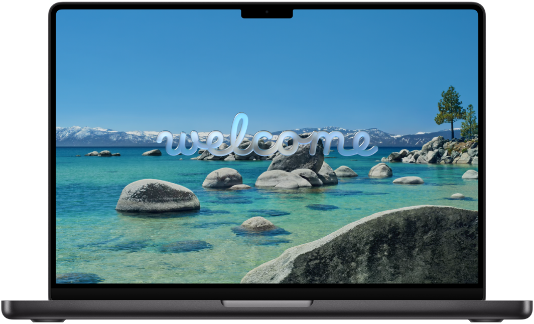 An open MacBook Pro with “Welcome” on the screen.