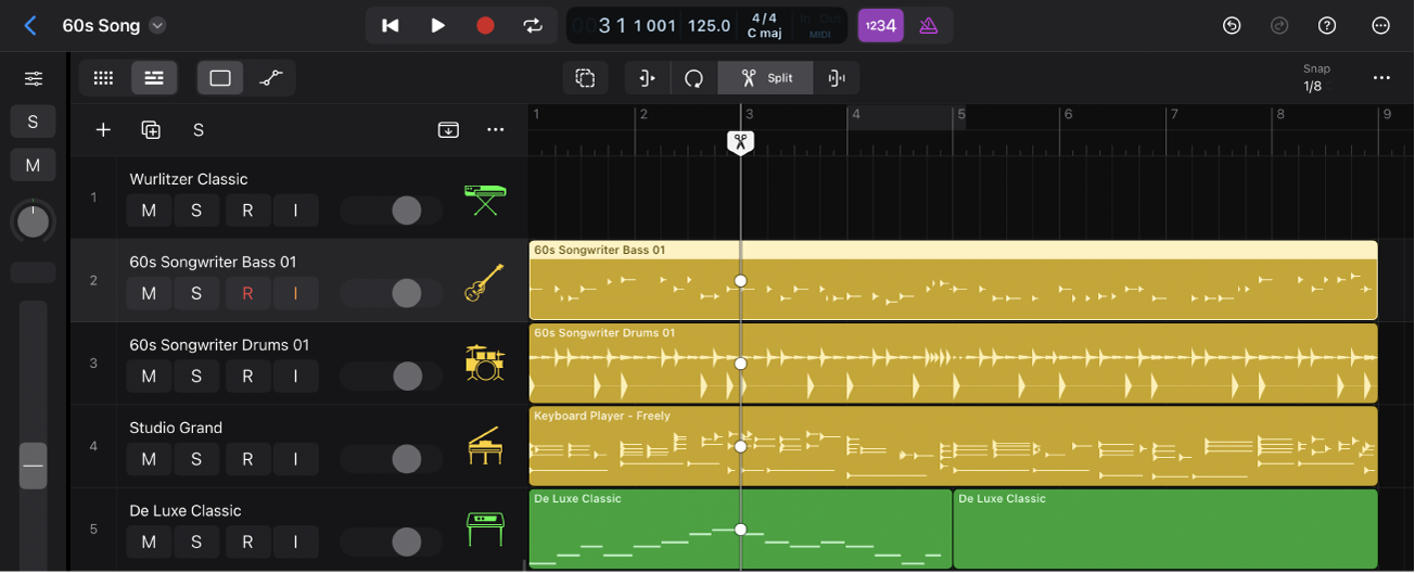 Figure. The Tracks area showing the Scissors tool in the ruler and multiple regions with white dots.