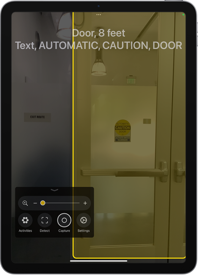 The Magnifier app is open and a door is being detected. A description shows how far away the door is and what the text on the door says.