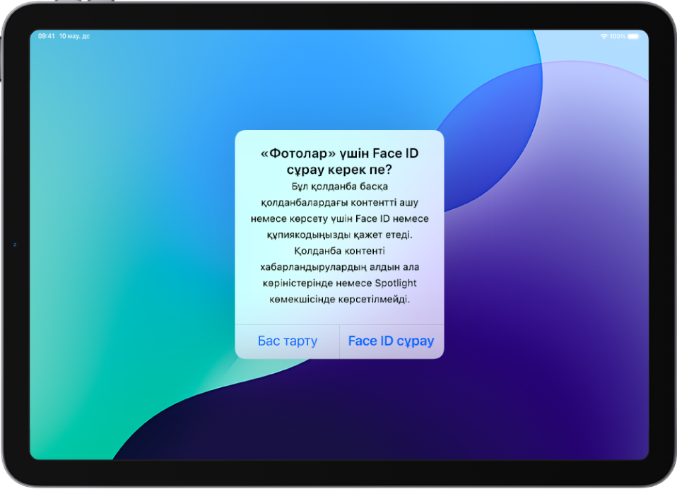 «Фотолар» қолданбасын ашу үшін Face ID сұрап тұрған iPad экранындағы ескерту.