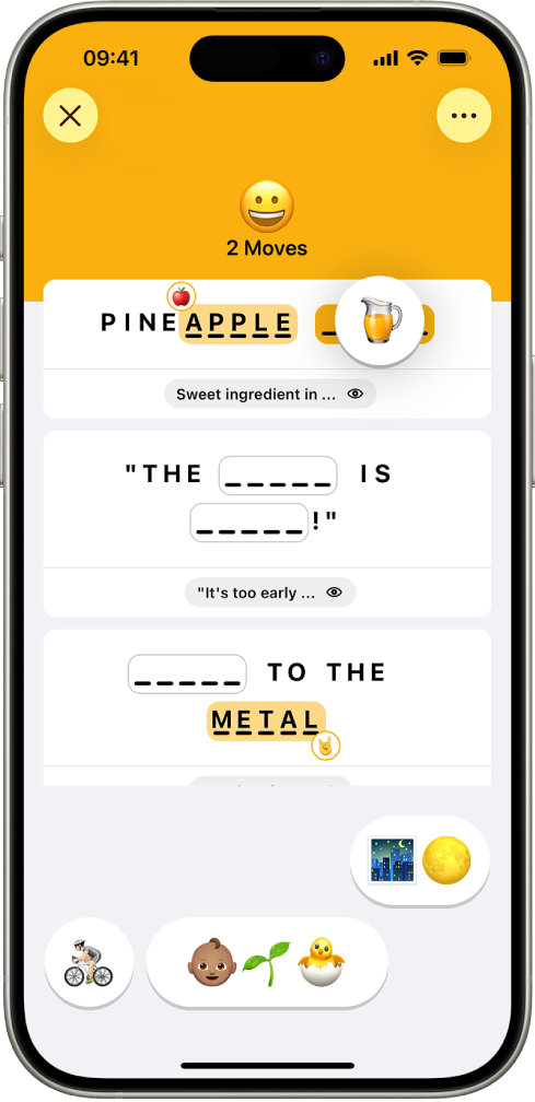 Le jeu Emoji affichant le nombre de coups, deux Emoji placés en tant que réponses, et un sur le point d’être placé dans un emplacement sans réponse.