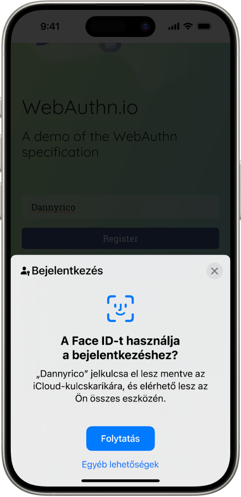 Az iPhone képernyőjének alsó részén megjelenik a lehetőség, hogy jelkulccsal jelentkezzen be webhelyekre. Látható a jelkulcs mentésére szolgáló Tovább gomb és az Egyéb lehetőségek gomb.