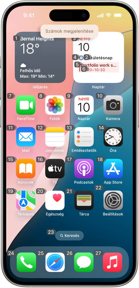 Egy iPhone, amelyen minden elem mellett egy-egy szám látható a Főképernyőn. A képernyő tetején a „Számok megjelenítése” Hangvezérlés-parancs jelenik meg.