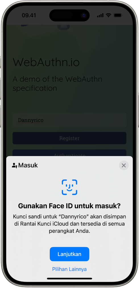 Setengah bawah layar iPhone memberikan pilihan untuk menggunakan kunci pass untuk masuk ke situs web. Layar memiliki tombol Lanjutkan untuk menyimpan kunci sandi, dan tombol Pilihan Lainnya.