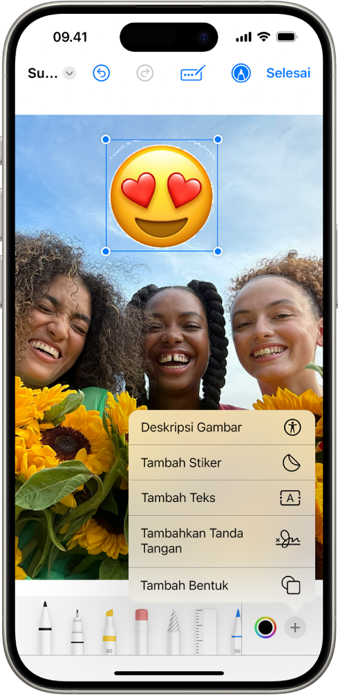 Di Mail, PDF lampiran memiliki stiker emoji. Di bawah halaman web terdapat alat markah.
