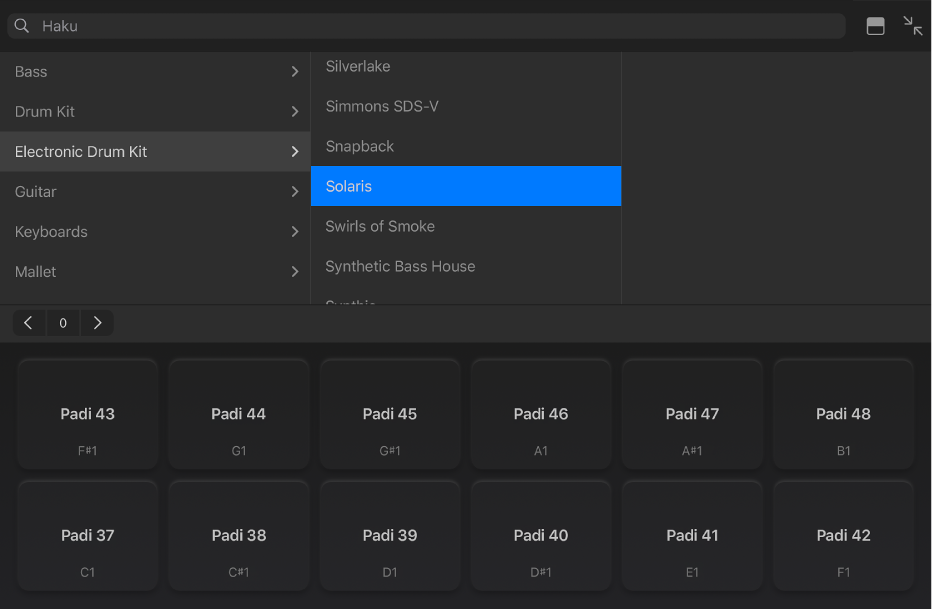 Kuva. Rumpupadi-kosketusinstrumentti ja kirjasto.