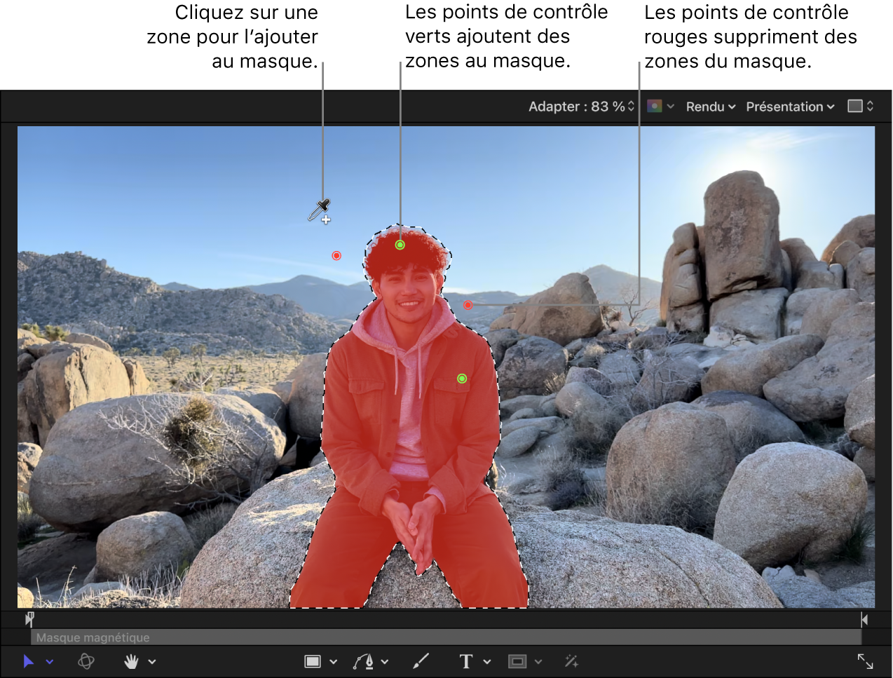 Le canevas montrant un masque magnétique appliqué à une personne au premier plan. La pipette Ajouter est active et des points de contrôle verts et rouges indiquent des zones ajoutées au masque ou supprimées du masque.
