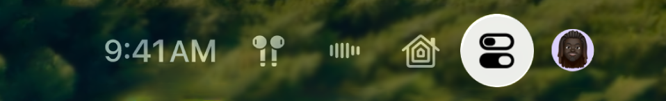 The top-right part of Control Center on Apple TV. AirPods appear to the right of the time.
