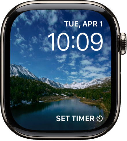 The Timelapse watch face showing a timelapse video of a scenic locale. At the bottom is the Compass Heading complication.