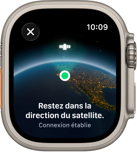 Écran montrant une icône de satellite sur une vue incurvée de la Terre, un indicateur de connexion vert et le texte Restez dans la direction du satellite.