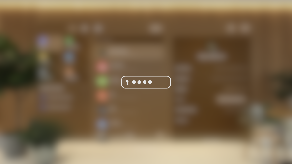 The view on Apple Vision Pro while a password is typed, as seen by someone watching on a mirrored display. The view is blurred, and an image indicates that the user is entering a password.