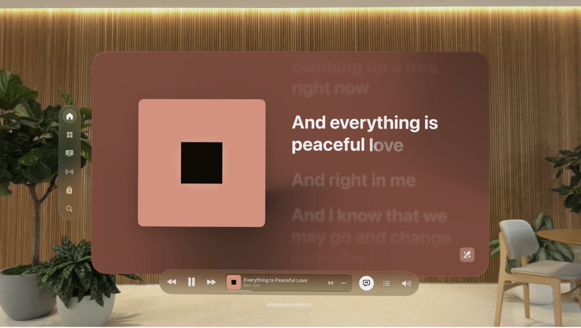 Apple Vision Pro 上的“音乐” App 窗口，显示歌词以及窗口底部的播放器控制。