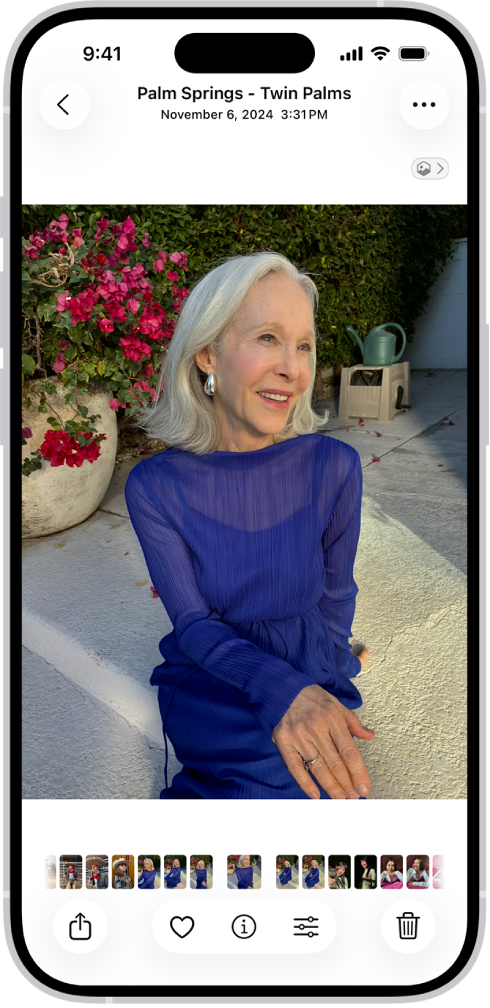 Ein geöffnetes Foto mit Miniaturen weiterer Fotos entlang des unteren Bildschirmrands. Links oben befindet sich die Taste „Zurück“, um zum Durchsuchen zurückzukehren.