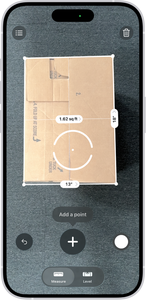 A screen showing the measurement of the dimensions of a box in the Measure app. The area of the box is calculated from the measurements of the dimensions.