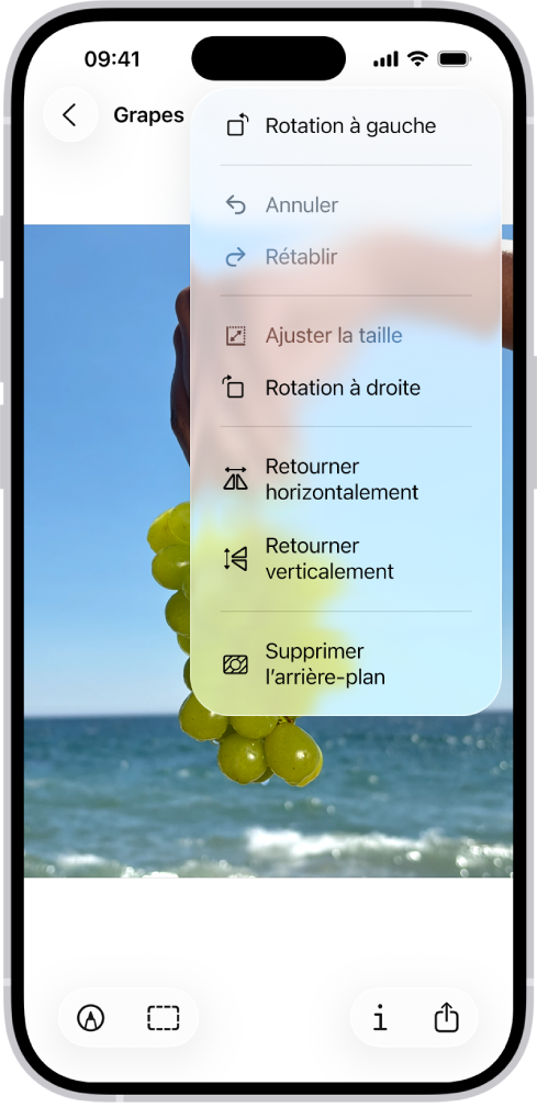Écran montrant une image avec du raisin au premier plan. Un menu affiche l’option « Supprimer l’arrière-plan ». En bas de l’écran se trouvent les boutons Annoter, Recadrer, Infos et Partager.