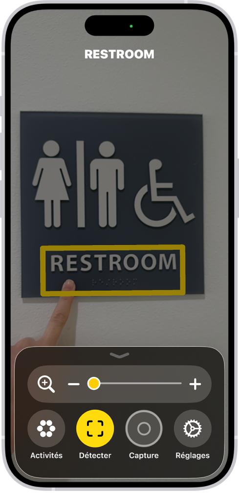 L’app Loupe qui détecte un doigt pointant du texte sur un mur.