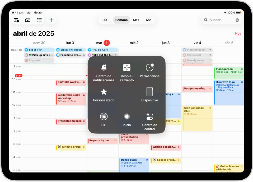 Un iPad con el menú de AssistiveTouch abierto, donde están los controles para centro de notificaciones, dispositivo, centro de control, inicio, Siri y personalizado.