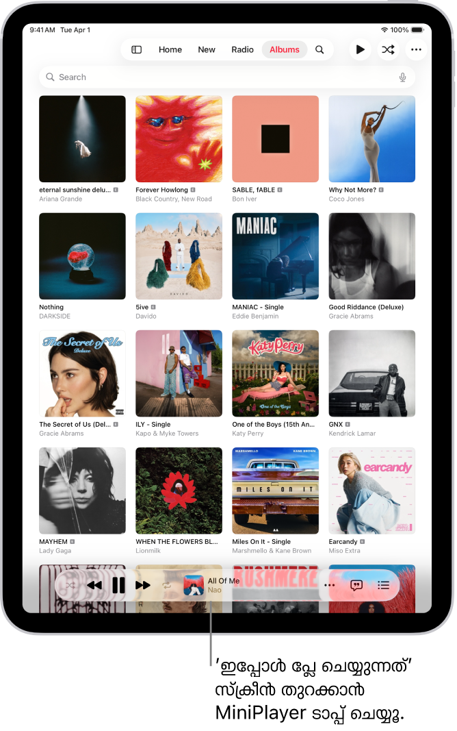 ലൈബ്രറി അടുത്തിടെ ചേർത്ത സ്ക്രീൻ, താഴെയുള്ള MiniPlayer എന്നിവ കാണിക്കുന്നു. പ്ലേ ചെയ്യുന്ന പാട്ടിന്റെ ടൈറ്റിൽ MiniPlayer കാണിക്കുന്നു. ‘പോസ് ചെയ്യൂ’, ‘അടുത്ത ട്രാക്ക്’ എന്നീ ബട്ടണുകൾ പാട്ടിന്റെ ടൈറ്റിലിന്റെ വലതുവശത്താണ്.