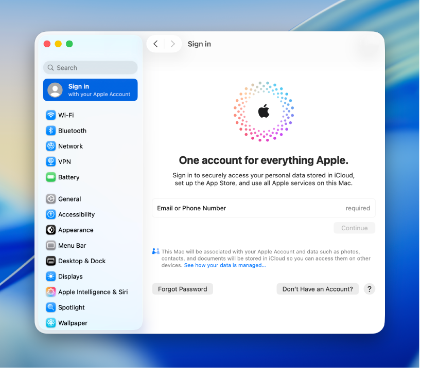 Apple 계정 로그인 설정을 표시하는 시스템 설정이 열려 있는 Mac 데스크탑.