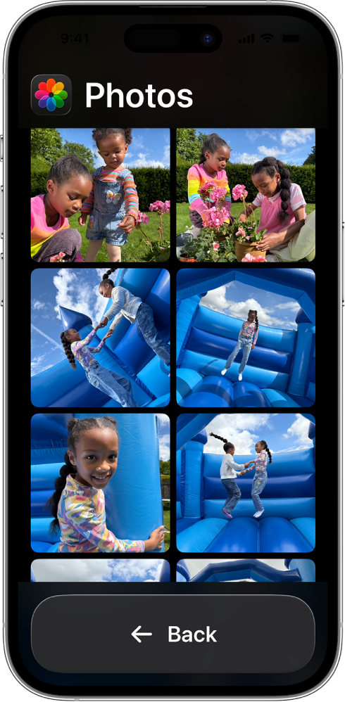 An iPhone in Assistive Access showing a large grid of photos.