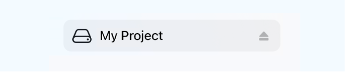 The Eject button next to the name of a disk.