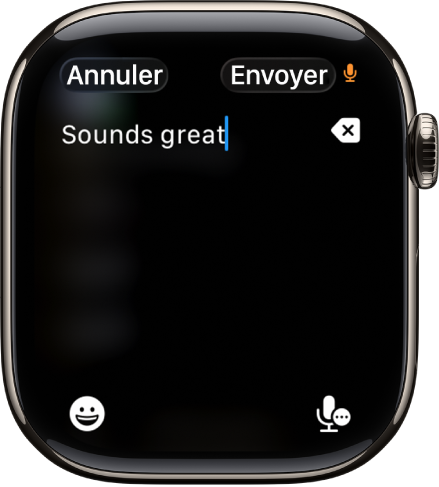 L’écran du champ de texte affichant un message créé avec la dictée. Les boutons Emoji et Dictée se trouvent en bas de l’écran.