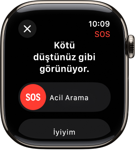 Acil servis aramasını başlatmak için SOS sürgüsünü ve Ben iyiyim düğmesini gösteren Düşme Algılama ekranı.