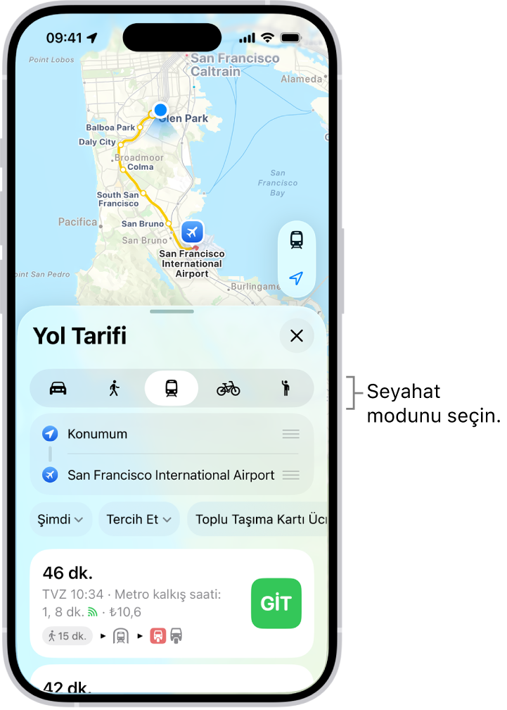 İki konum arasında birçok güzergâh seçeneğini gösteren bir harita. Başka seyahat modlarını seçme, başlangıç noktasını ve hedefi değiş tokuş etme ve yol tarifini adım adım görüntüleme düğmeleri var.