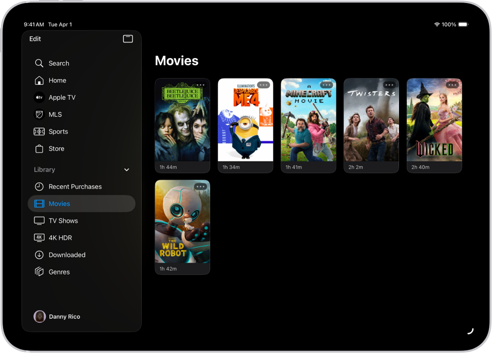 An iPad showing a list of movies in the Movies section of the Library tab.