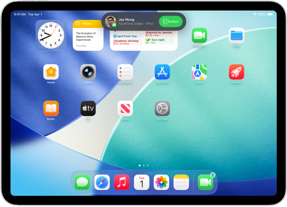 The iPad Home Screen showing a FaceTime video call notification from an iPhone at the top. Tap Switch to move the call to your iPad.