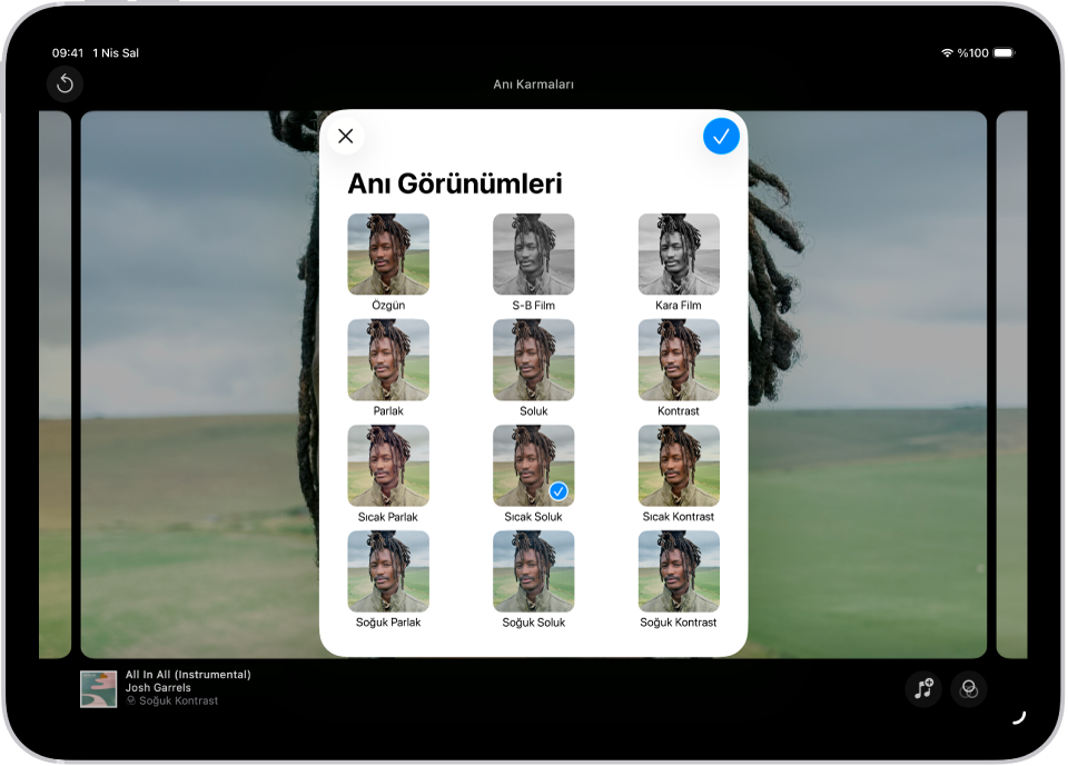 Bir anı filmi oynatılıyor; ekranın ortasında bir anı görünümü uygulama seçenekleri var.