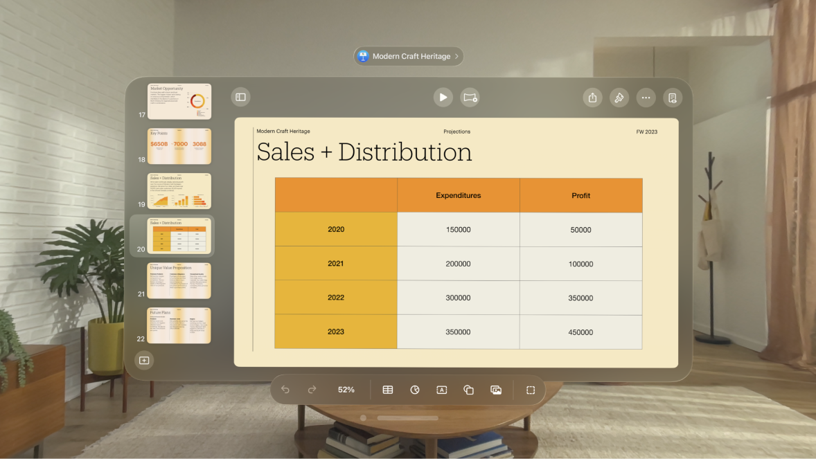 The Keynote app on Apple Vision Pro, with a table visible on the slide.